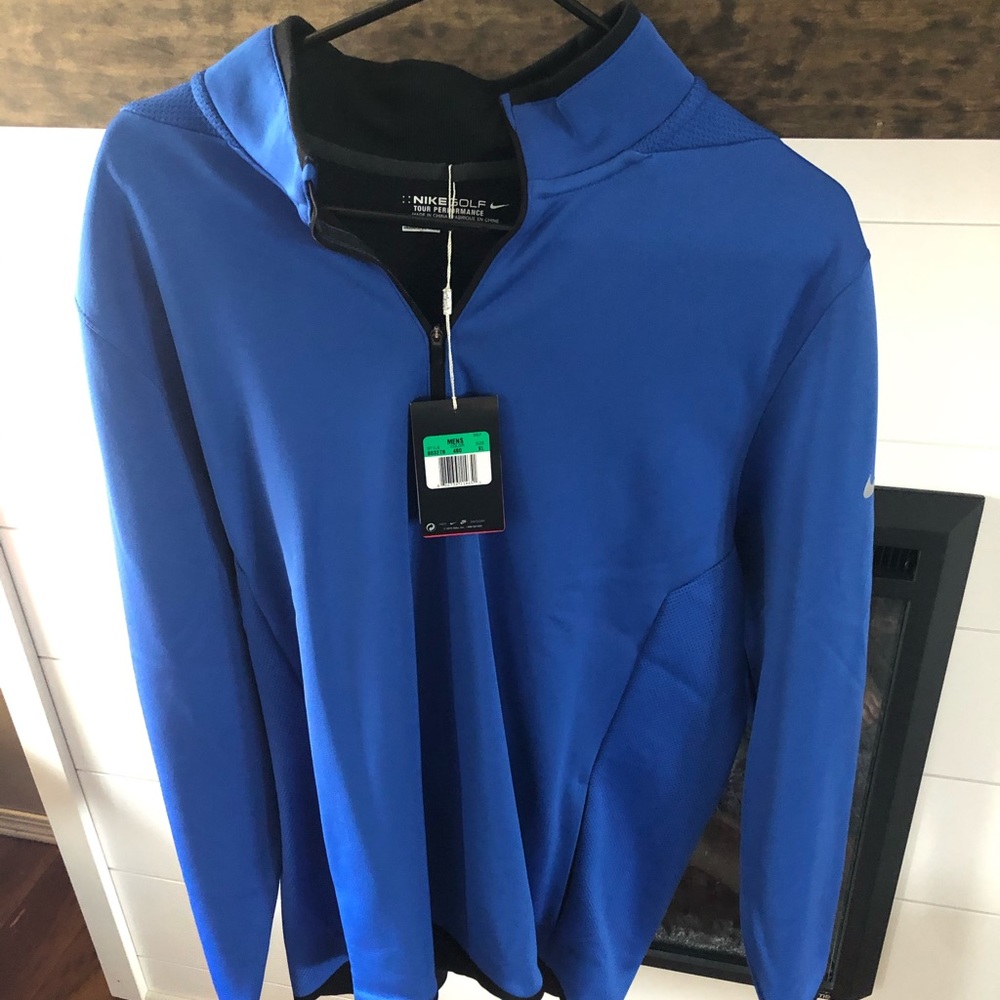 Blue Nike golf thermafit
